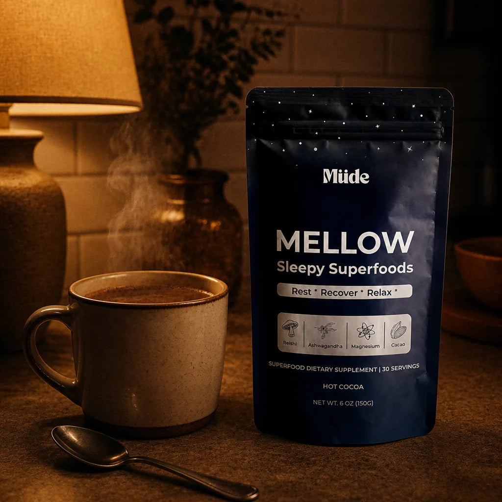 Mellow pouch on an evening kitchen counter beside a steaming mug of cocoa in soft lamplight