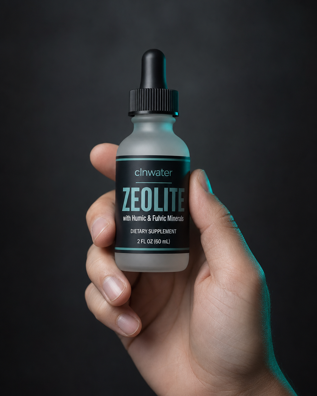 Hand holding clnwater Zeolite drops